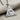 Celestial All-Seeing Eye Pendant, polished silver, angled view on fabric