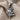 Dancing Doll Pendant, oxidized silver, angled close-up view