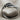 Overlapping Leaf Ring, oxidized silver, front view on linen fabric