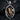 Close-up of oxidized silver rock climber pendant displayed on dark slate background highlighting the gold vermeil details.