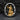 Close-up detail of the 14K gold vermeil figure sculpting himself inside the oxidized silver ring frame
