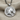 Horse Medallion Pendant, polished silver, front view on fabric