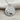 Moon and Stars Medallion Pendant, polished silver, product photo on textured fabric