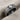 Grooved Solitaire Ring, angled view on fabric