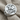 Saint George Dragon Slayer Ring, polished silver, angled view on fabric