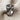 Orixa Oxossi Ring, oxidized silver, angled side view showing bow motif on band