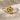 Plumeria Flower Ring, two-tone, product photo on linen