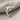 Arched Dolphin Pendant, polished silver, product photo on linen