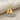 Hammered Sailboat Pendant, two-tone finish, product photo on linen