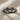 Swim Goggles Ring, black rhodium plated, on fabric background