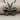 Bow Ribbon Pendant, black rhodium, front view on fabric