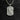 Angled view of the handcrafted St. Jude pendant, showing the depth of the carving and 'Pray For Us' text on the frame.