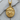 Handcrafted Saint Peter pendant resting on rustic wood, highlighting the premium 925 sterling silver craftsmanship