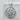 Rose Bouquet Pendant, polished, front view on stone pedestal