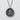 Hammered Truth Kanji Pendant, oxidized, front view on textured background