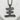 King Kanji Pendant, black rhodium, front view on textured stone