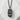 Spam Musubi Pendant, black rhodium finish, front view on white stone