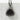 Grilled Onigiri Pendant, black rhodium, front view on white concrete