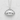 Detailed view of the gyoza dumpling pendant hanging from a silver cable chain resting on a bright textured surface