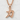 Chikara Japanese Strength Pendant, rose gold, product photo on textured background