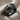 Bull Horn Ring, black rhodium, product view on fabric