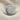 Hittite Seal Ring, polished silver, front view on fabric