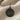 Front-facing view of the historic Alacahöyük deer standard drop earring highlighting the dark patina and metalwork.