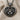Heart frame baby feet pendant, black rhodium plated, product view on fabric