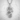 Lung Dragon Pearl Pendant, polished silver, front view on textured background