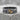 Capricorn Zodiac Band Ring, two-tone, product view on stone block