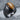 Geometric Tiger Eye Ring, black rhodium, three-quarter product view on stone