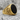 Airborne Onyx Ring, gold vermeil, angled side view on rock