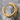 Fissured Brutalist Hoop Earring, gold vermeil, angled product view on stone