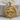 Saint George Medallion Pendant, gold vermeil, product photo on wood