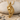 Pegasus Head Pendant, gold vermeil, product photo on stone and sand