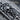 Santa Muerte Dog Tag Pendant, oxidized silver, close-up of skull relief and cross