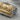 Last Supper Scene Signet Ring in two-tone, angled close-up of the relief scene
