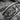 Close up of wide band religious ring depicting biblical scene with Jesus Christ and the Twelve Apostles in sterling silver