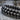 Dragon cuirass scale ring, oxidized, macro close-up of textured plates