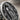 Our Lady of Guadalupe Ring, close-up of Virgin Mary and rose relief in oxidized silver