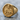 Sacred Heart Jesus Ring in gold vermeil, front angled view on stone