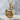 Floating Swan Pendant, gold vermeil, angled view on stone