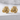 Sleeping Baby Dragon Earring, gold vermeil, pair displayed on stone surface