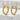 Coiled Dragon Earring, gold vermeil, pair shown on stone pedestal