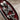 Valdaro Lovers Signet Ring, oxidized silver, close-up of skeleton relief and red enamel