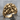 Skull Pile Signet Ring, gold vermeil, front view on stone