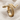 Spiral Serpent Ring in gold vermeil, front view on fabric
