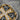 Acanthus Scroll Cross Pendant, close-up of scrollwork and stone-set cross details