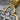 Crucifixion Scene Cross Pendant, oxidized, close-up of Holy Spirit dove and INRI plaque