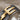 Teshub lightning ring, two color, macro close-up of raised thunderbolt relief